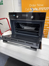 AEG 6000 Series GK6NK401B Combi Quick Compact Built-in Combination Microwave Oven in Black from HomeWise Appliances. Shop photo front with door open.