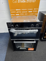 Beko BBXDF25300X Electric Double Built-in Oven in Black & Stainless Steel - A/A Rated shop photo of oven in front of call to action sales banner. Call 01606272727