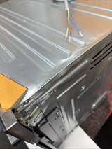 AEG 6000 Series GK6NK401B Combi Quick Compact Built-in Combination Microwave Oven in Black from HomeWise Appliances. Shop photo showing minor dents on the outer casing.