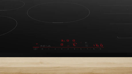 Bosch Series 6 PXV831HC1E 80cm 5 Zone Induction Hob with Flex Induction Zone Stock Photo Hob close up of the LED display  and touch controls